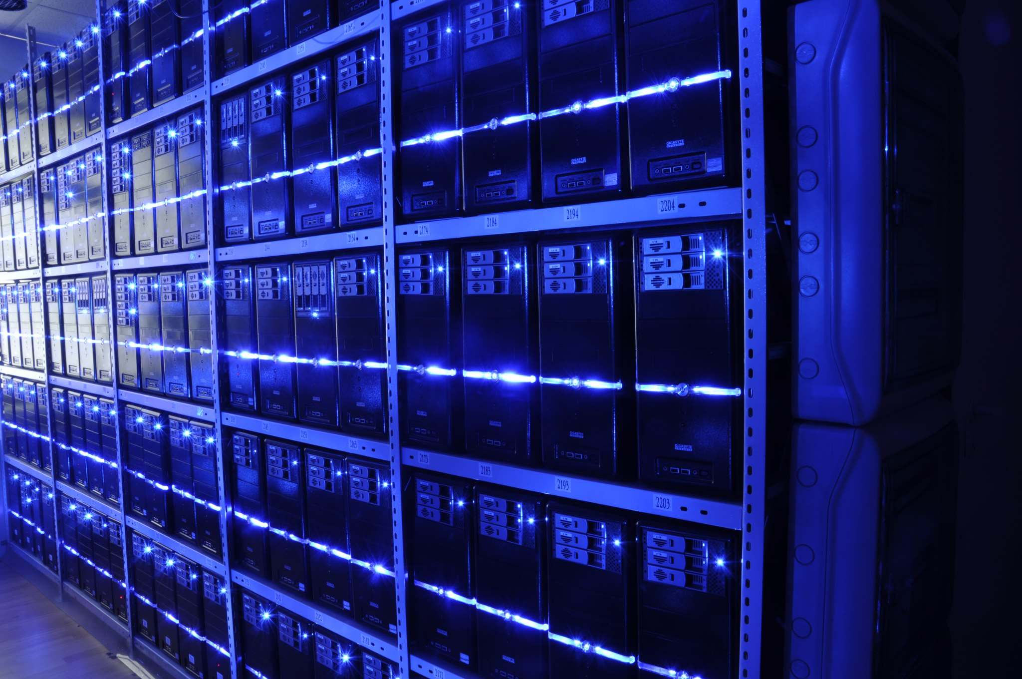 Server rack with networking equipment in a data center room